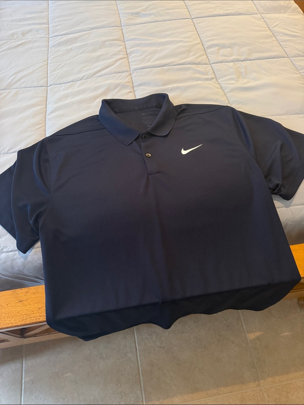 Nike Men’s Navy Polo with White Swoosh